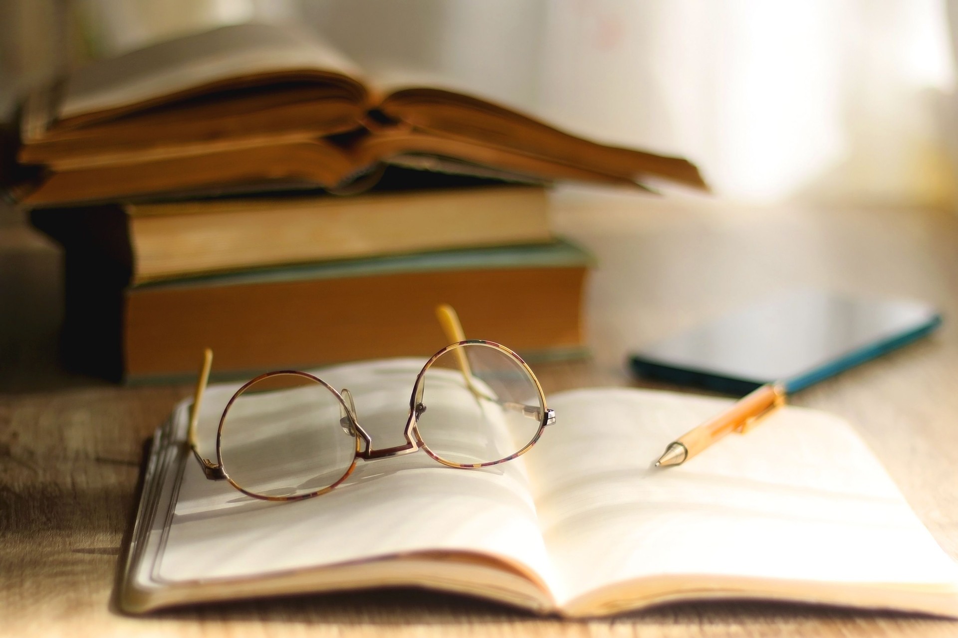 Notebook, Pencil, Glasses, Phone and Books